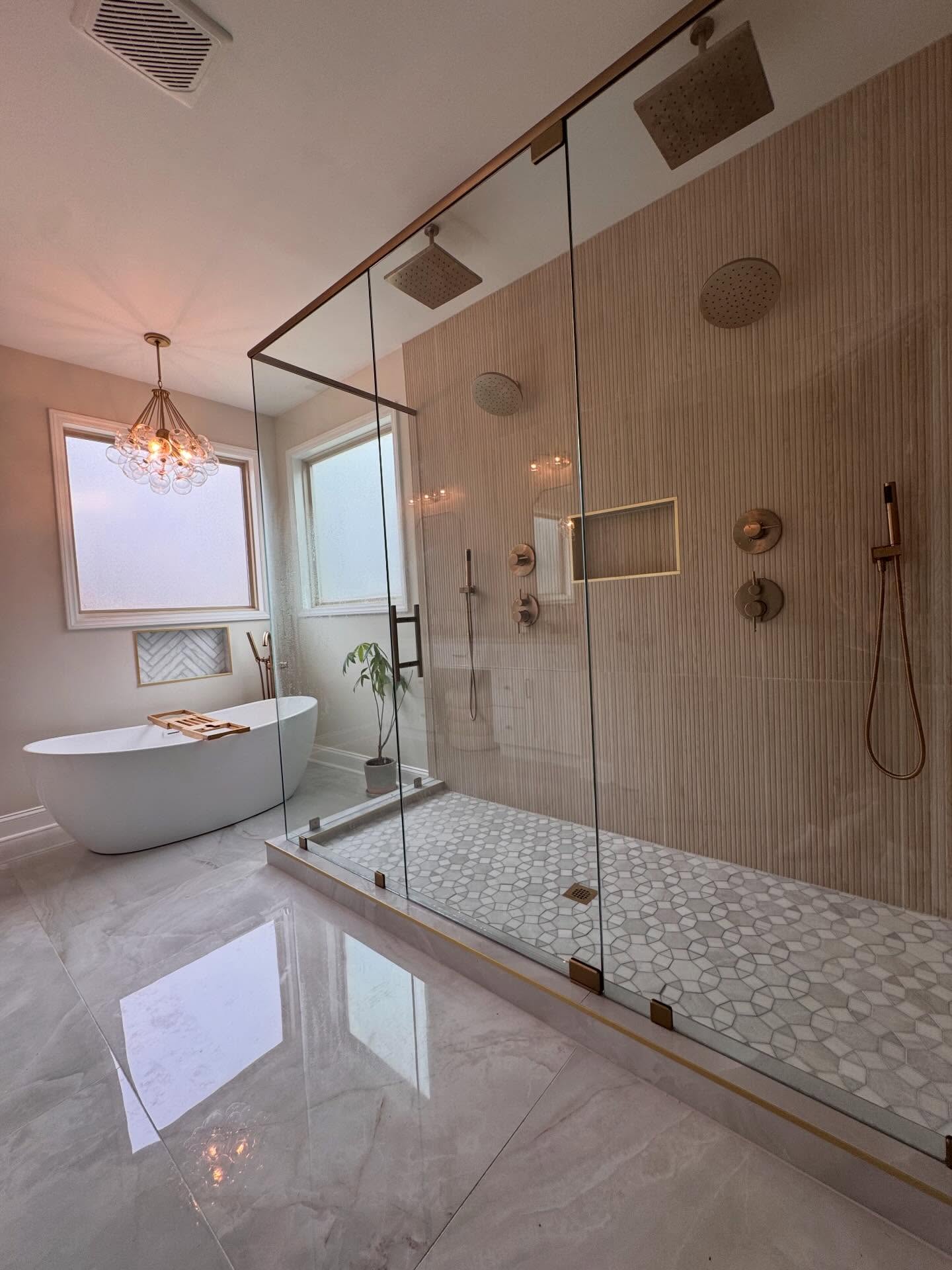 Ellicott City Maryland primary bathroom after remodeling with walk-in shower and freestanding tub