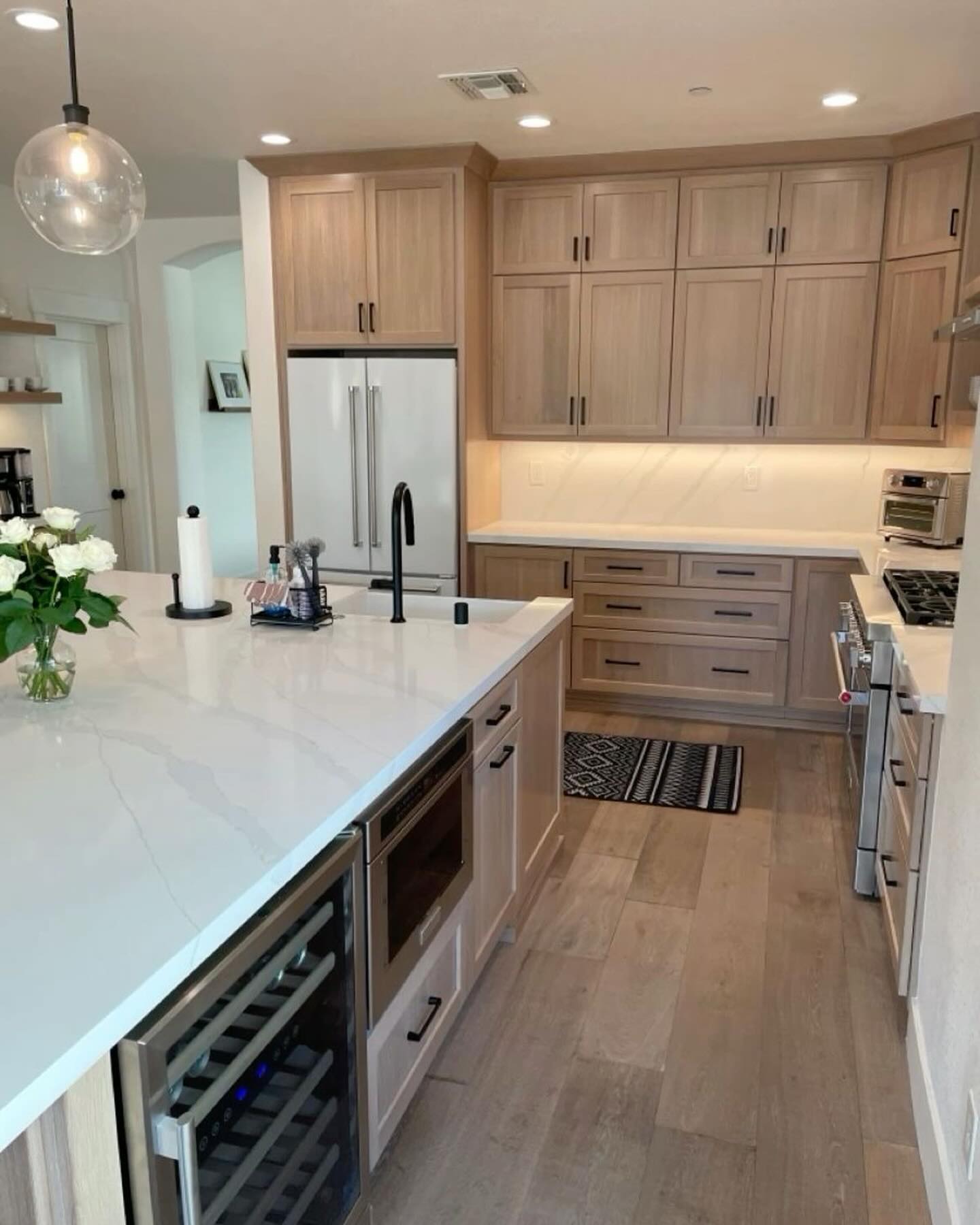 Springfield Virginia kitchen after remodeling with light gray cabinetry and quartz countertops